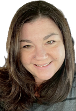 A light complexed woman with medium length brown straight hair, brown eyes, smiling, wearing a green shirt with black stripes